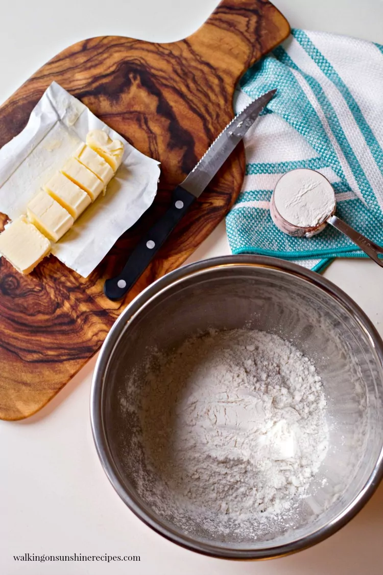 Ingredients for Homemade Biscuits with cutting board and bowl from Walking on Sunshine Recipes
