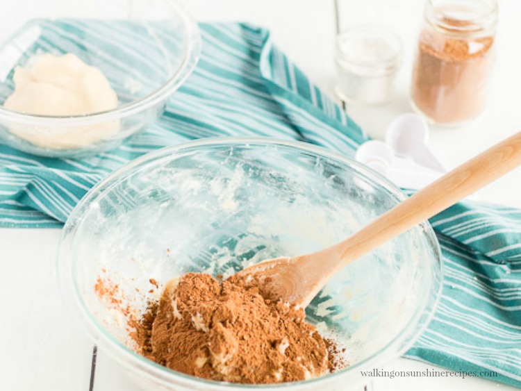 Add cocoa powder to vanilla cookie dough mixture. 