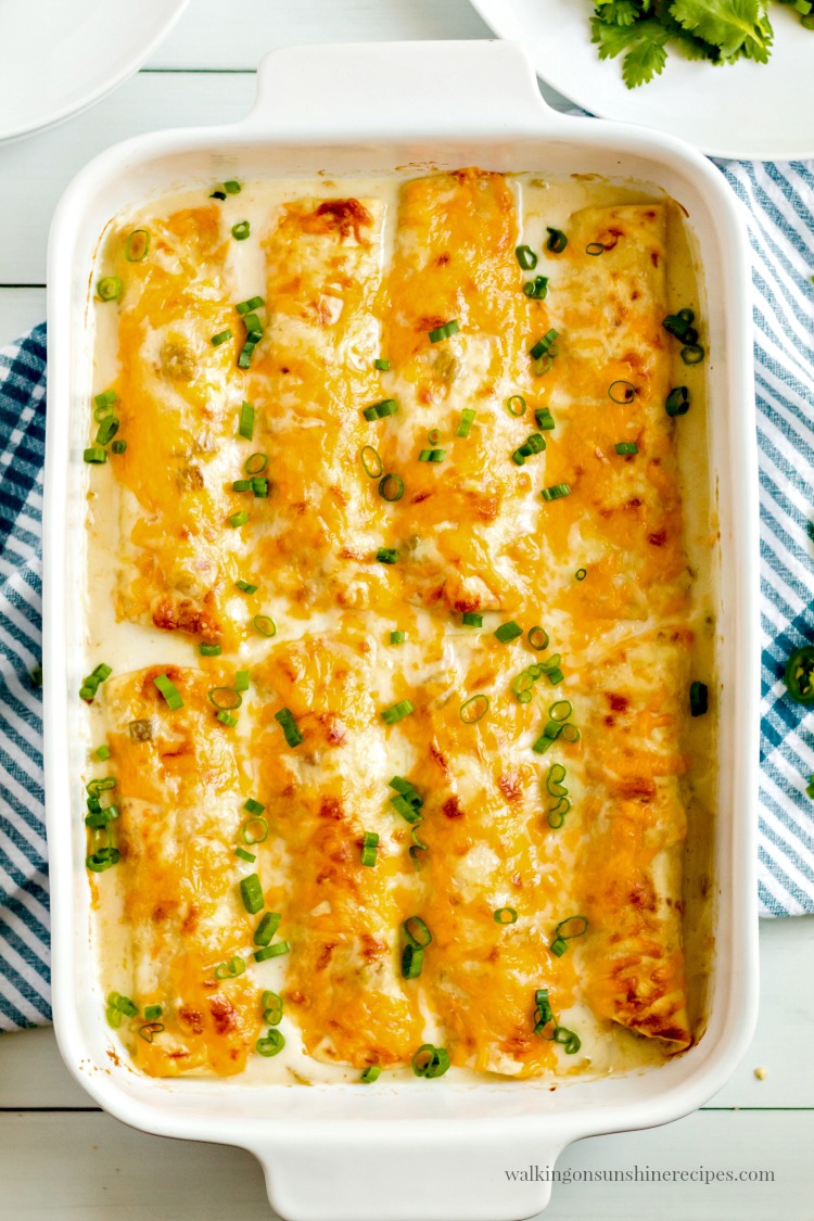 Sprinkle chopped onions on top of Creamy Chicken Enchiladas when done baking. 