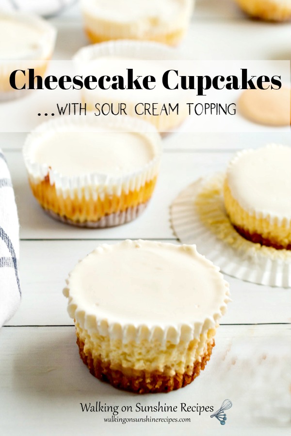 Cheesecake Cupcakes with Sour Cream Topping on wooden board