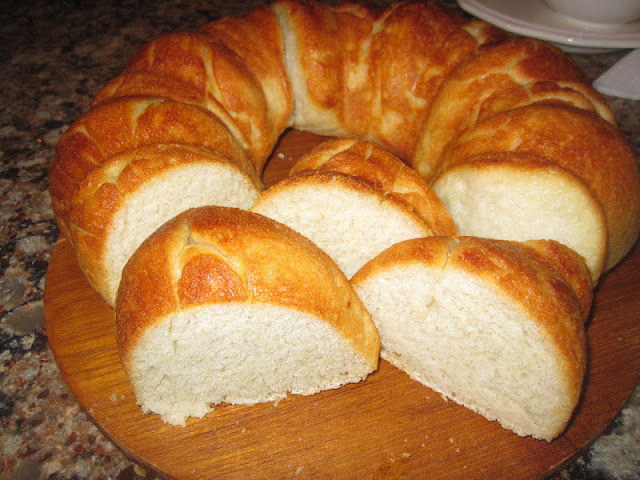 Homemade Italian Bread sliced on a cutting board from Walking on Sunshine.