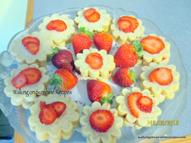 Strawberry Cream Cheese Tea Sandwiches made with Flower Shape Bread Forms from Walking on Sunshine Recipes. 