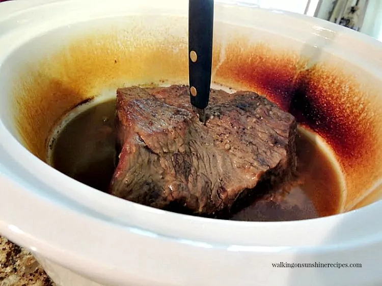 Pot roast is done when you can stick a pairing knife in the center easily.