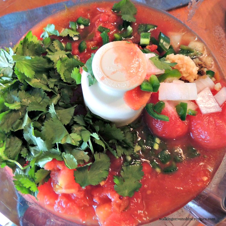 Homemade salsa is not only delicious, it's easy to make. You may never buy a jar again! This recipe takes under 10 minutes to make so get the chips ready from Walking on Sunshine Recipes. Homemade Salsa Ingredients in Food Processor