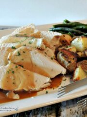 Crock Pot Turkey Breast on white platter