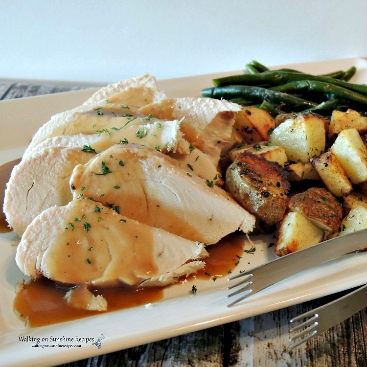 Crock Pot Turkey Breast on white platter