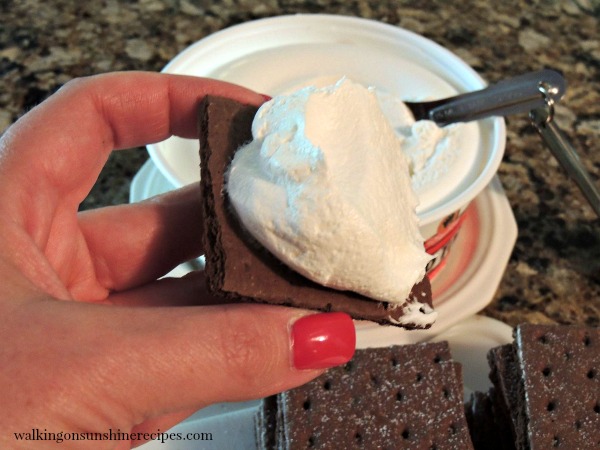 Add a tablespoon or two of frozen whipped topping to graham crackers. 