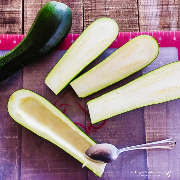 Use a spoon to hollow out zucchini