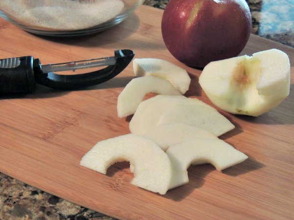 Apples, peeled, cored and sliced for Apple Tart from Walking on Sunshine Recipes