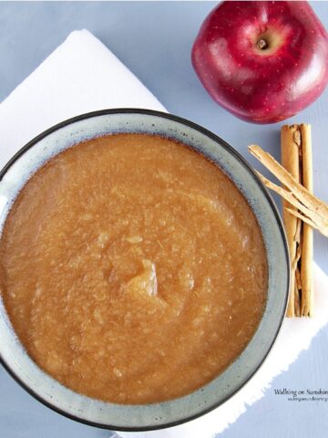 Homemade Applesauce in bowl with apple