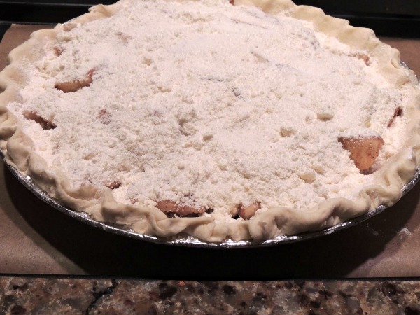 Cover the pie with the crumb topping right before baking. 