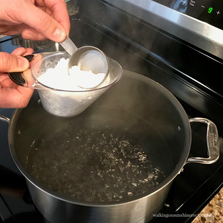 Add baking soda to boiling water for Homemade Pretzel Bites from Walking on Sunshine Recipes