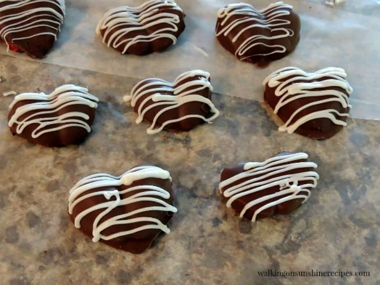 Heart Shaped Chocolate Covered Strawberries with white chocolate drizzle from Walking on Sunshine