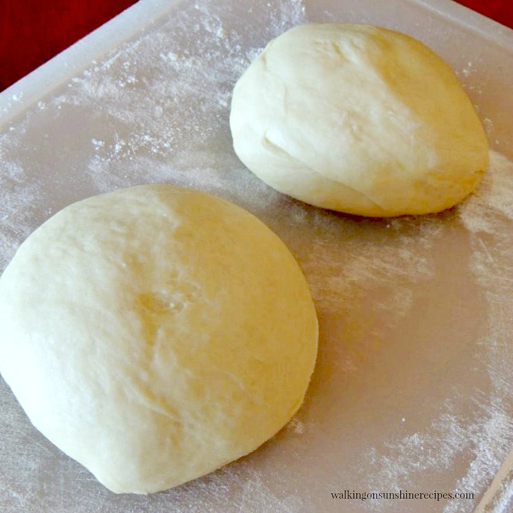 Two loaves of bread dough for Easter Bread