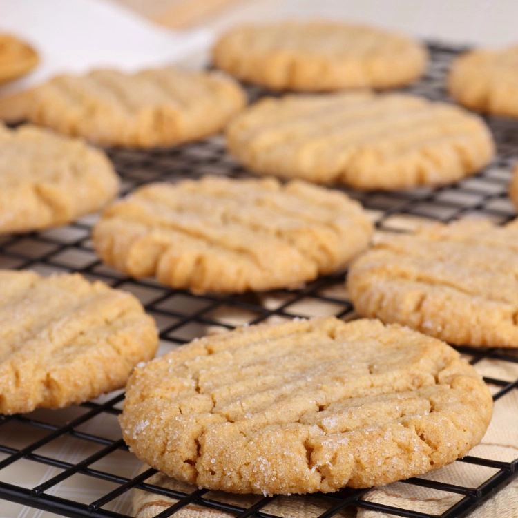 peanut butter cookies made with cake mix on cooling rack. 