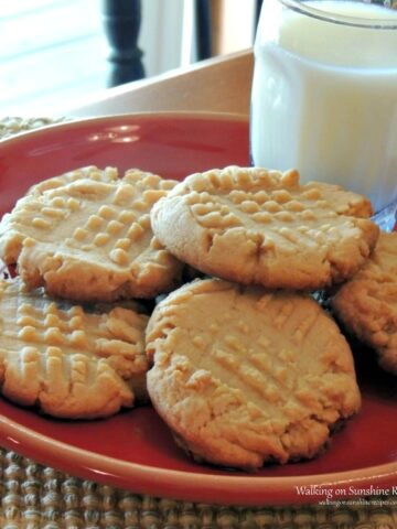 Peanut Butter Cookies with glass of milk on red plate. Cookies made from Cake Mix