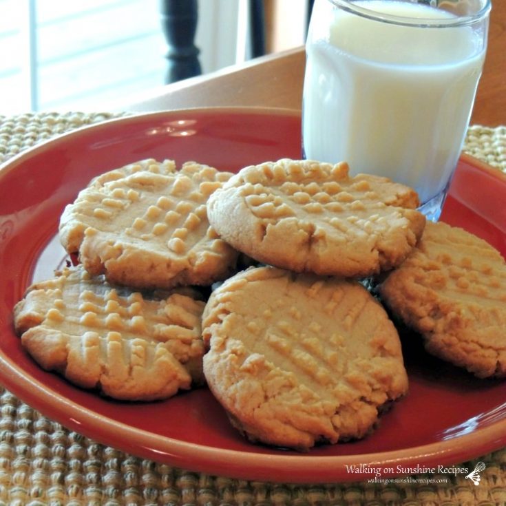 Peanut Butter Cookies with glass of milk on red plate. Cookies made from Cake Mix