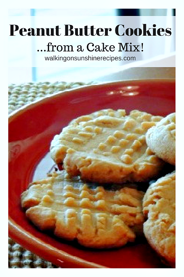 cake mix peanut butter cookies on a red plate with a glass of milk in the background. 