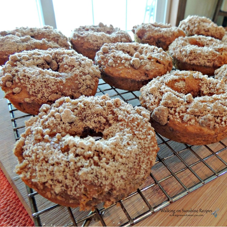 Closeup of Pumpkin Crumb Donuts on wire rack before adding glaze from Walking on Sunshine Recipes