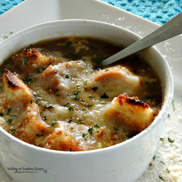 Easy French Onion Soup with Homemade Croutons served in white bowl. 