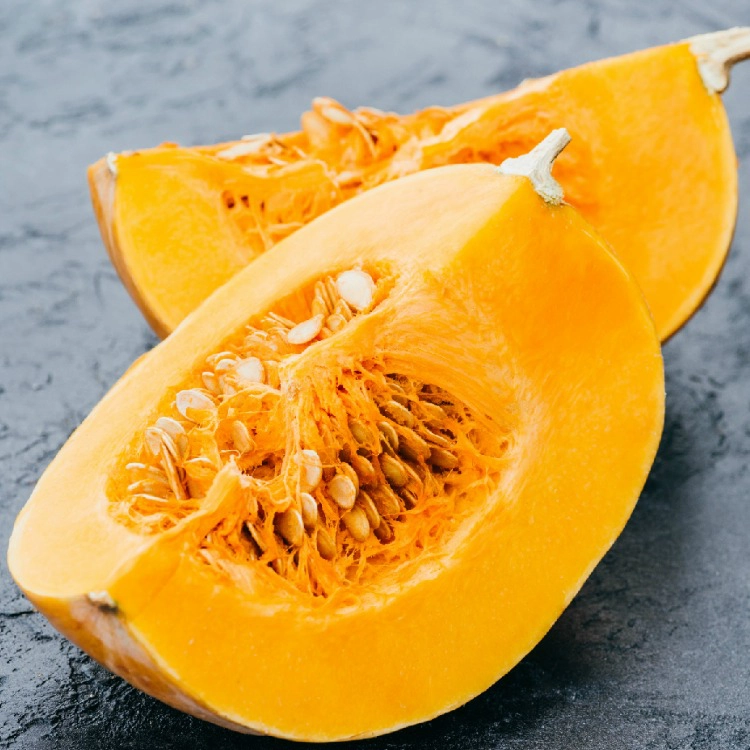 Cut open pumpkin with seeds from WOS