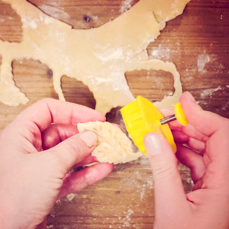 Cutting out shapes with pie dough