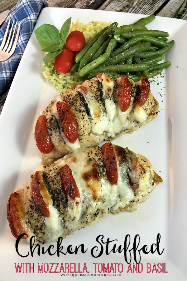 Hasselback Chicken stuffed with tomatoes, cheese and basil from Walking on Sunshine Recipes.
