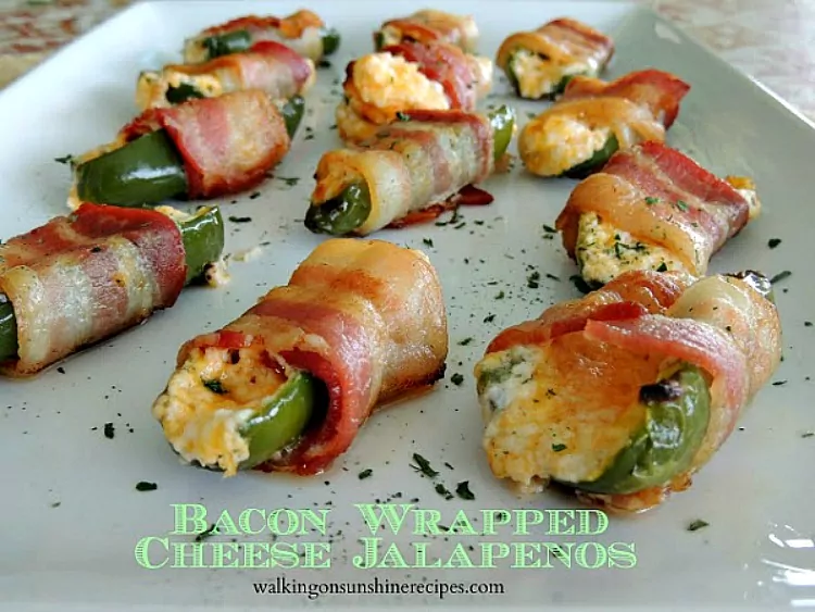 Bacon Wrapped Cheese Jalapenos on white tray. 