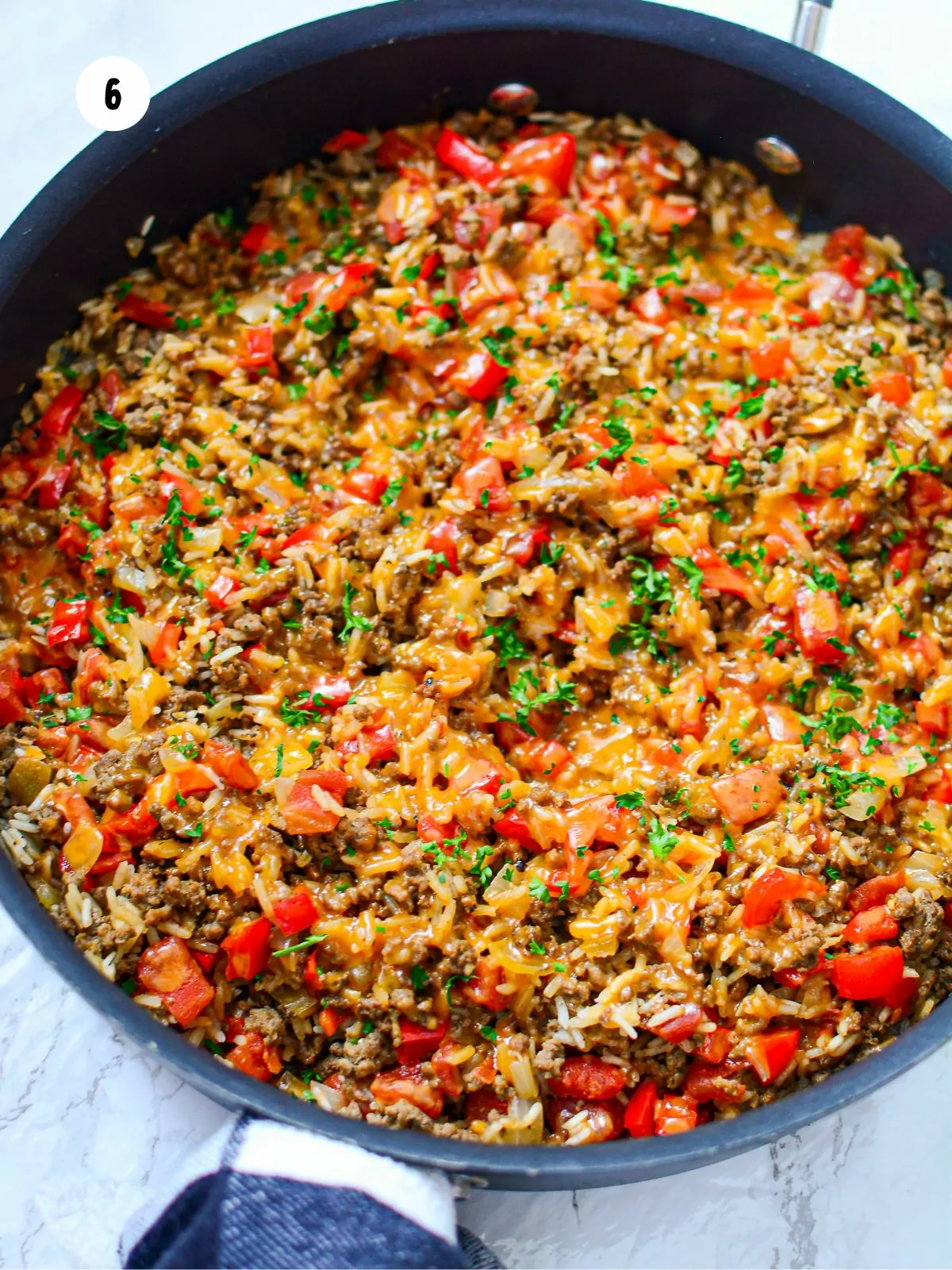 Sprinkle with cheese and garnish with parsley