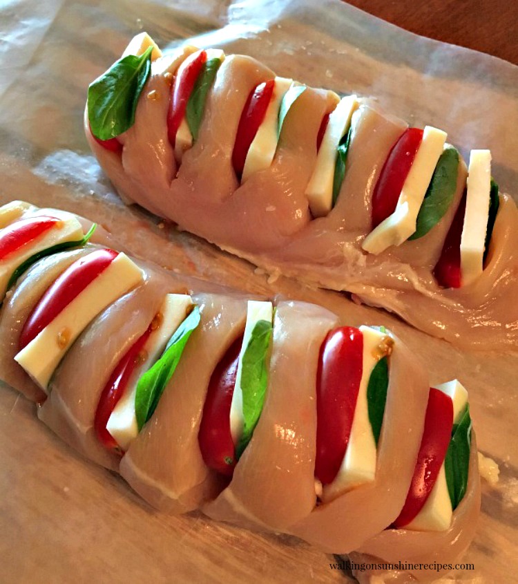 Chicken mozzarella tomato stuffed in slits. 