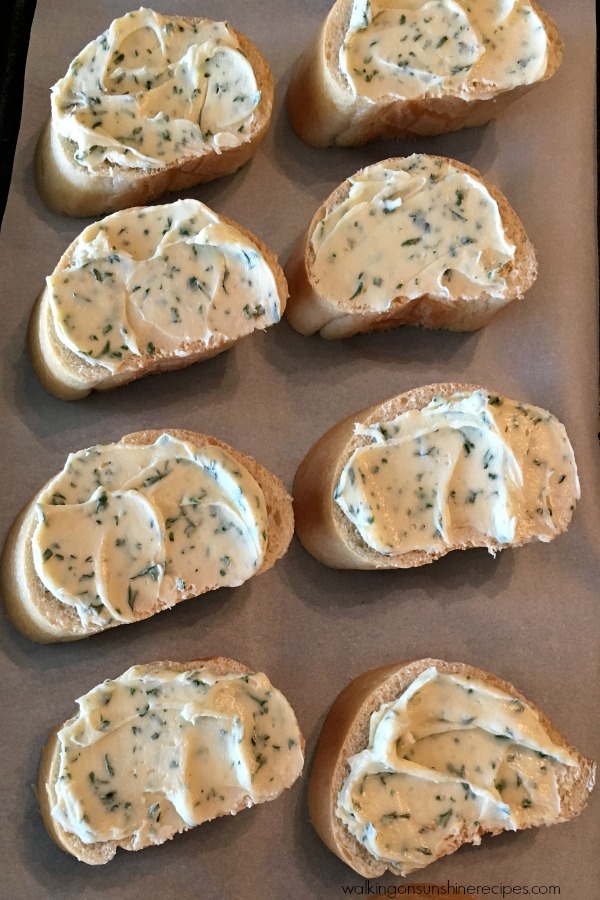 homemade garlic butter on French bread slices