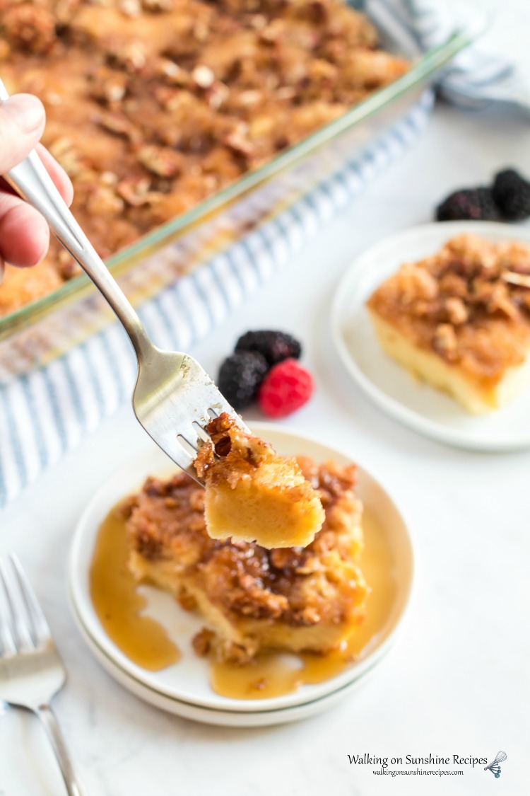One serving of French Toast Breakfast Casserole with maple syrup