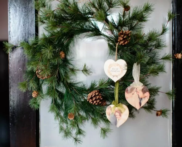 PhotoBoard ornaments hung on a Christmas wreath featured on Walking on Sunshine. 