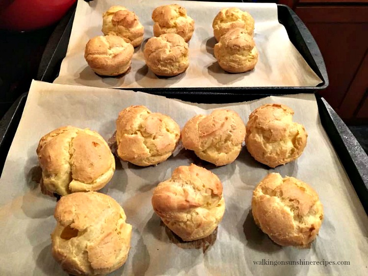 Cream Puffs on Baking Tray with Parchment Paper fresh from the Oven
