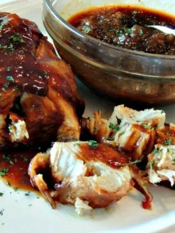 cropped-Bacon-Wrapped-Chicken-on-platter-with-apples-and-BBQ-sauce-in-bowl.jpg