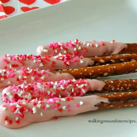 Valentine's Day Chocolate Covered Pretzels on white plate from Walking on Sunshine