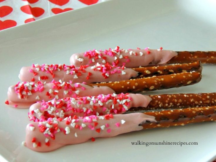 Valentine's Day Chocolate Covered Pretzels on white plate from Walking on Sunshine