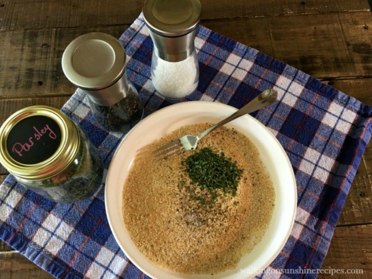 Add parsley, salt and pepper to bread crumbs.