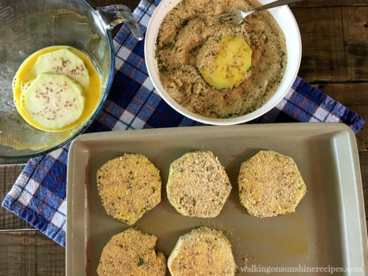 Dip the eggplant slices in the beaten eggs and then dredge in the breadcrumbs.