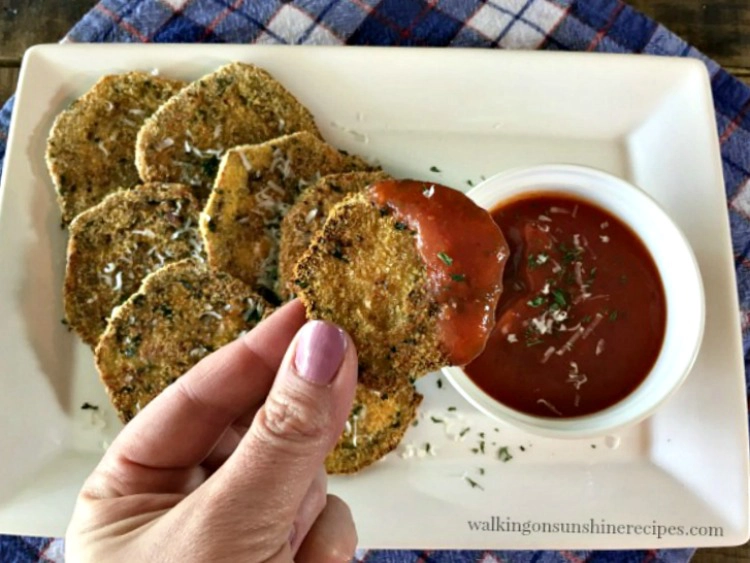 Enjoy healthy baked crispy eggplant dipped in homemade tomato sauce.