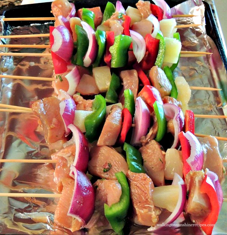 Chicken Kabobs made with peppers, onions, and chicken ready for the grill. 