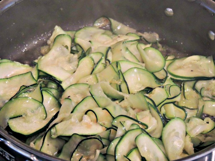 Saute Zucchini in pan with oil and butter