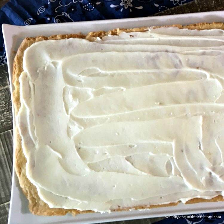 Spread Cream Cheese Mixture over Baked Sugar Cookie Crust