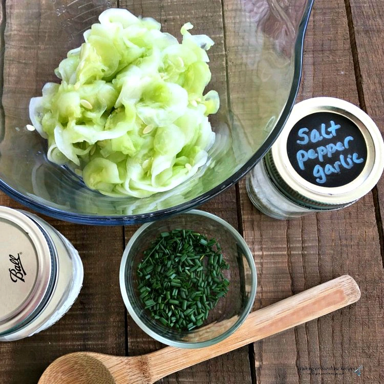 Putting Oma's German Cucumber Salad recipe together