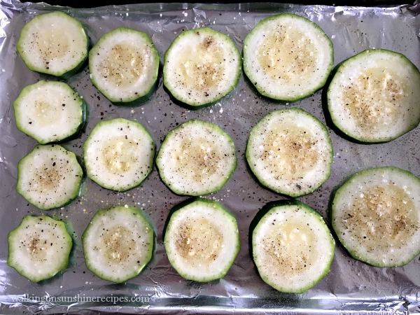 Zucchini on Tray before cooking for Zucchini Pizza Bites from Walking on Sunshine