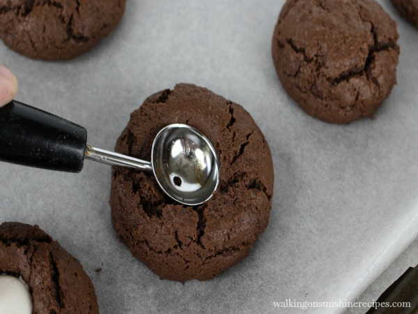 Make an indent in the cookies to add the eye candies.