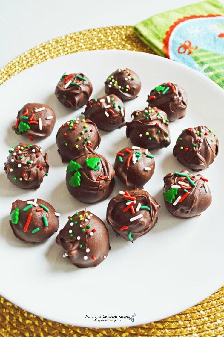 Oreo Cookie Truffles on white plate.