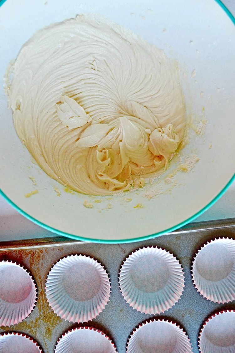 Add vanilla cake batter to cupcake muffin pan