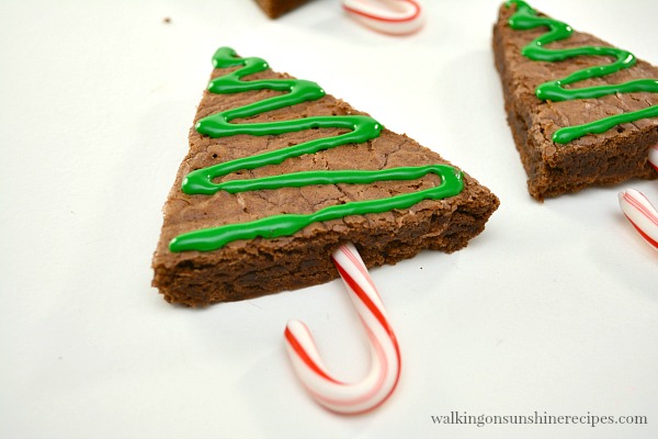Add small candy canes to the bottom of the triangle shaped brownies from Walking on Sunshine Recipes