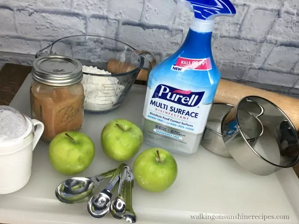 Purell Multi Surface Cleaner on cutting board with Baking Ingredients from Walking on Sunshine Recipes
